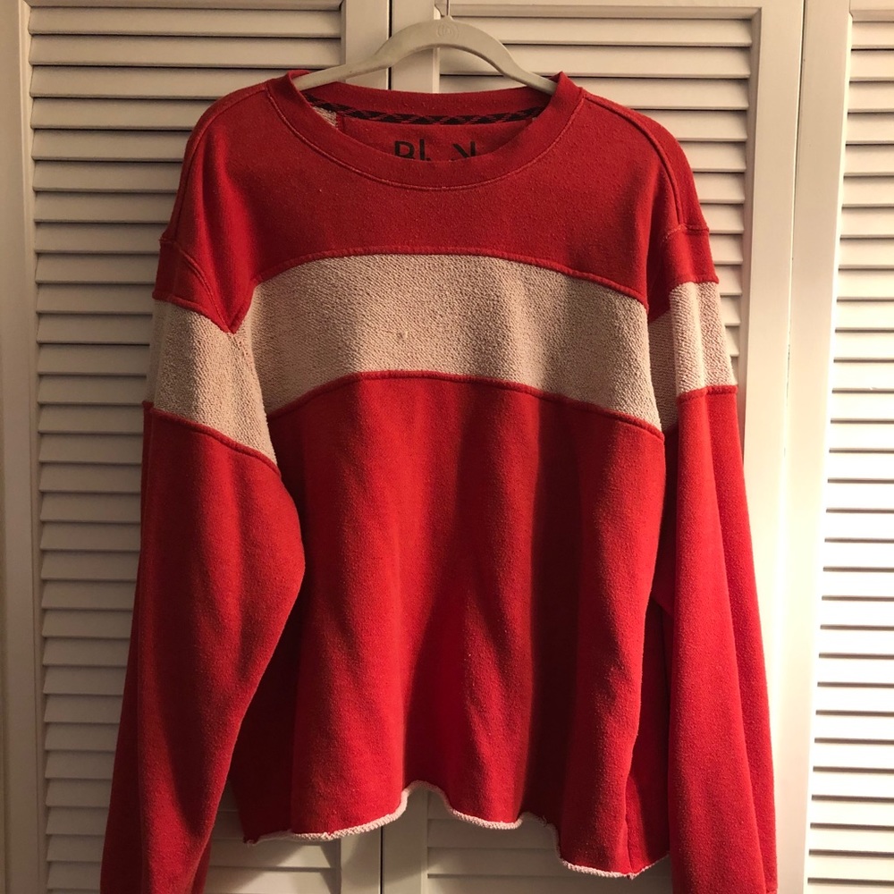 Red sweatshirt with raw edge